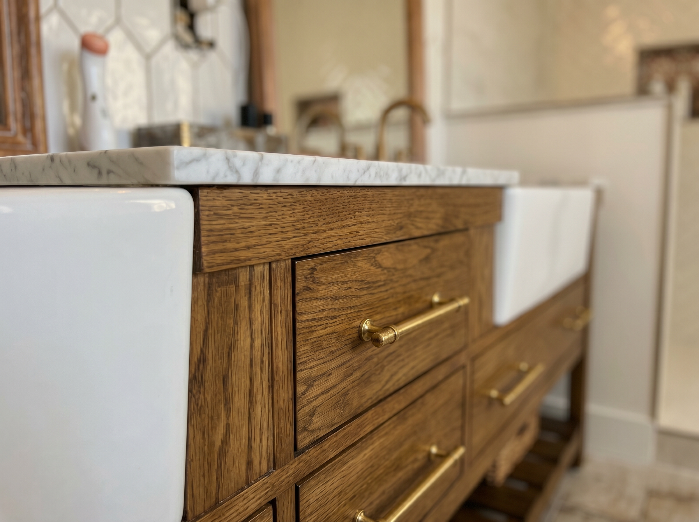 Custom wood double vanity with brass fixtures and quartz countertop — luxury master bath — May Construction
